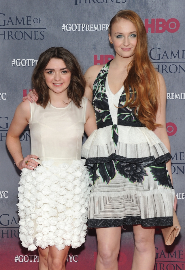 Stark sister style. Maisie and Sophie attend the 'Game Of Thrones' Season 4 premiere in 2014 dressed in white.