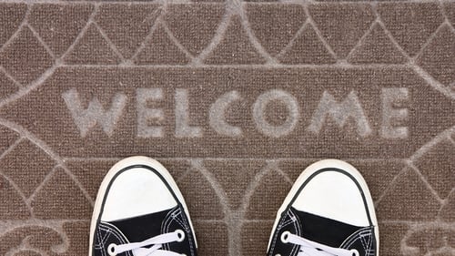 Removing shoes before online entering home