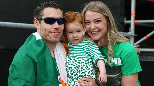 Irelan's Jason Smyth celebrates with his wife and daughter Elise and Evie