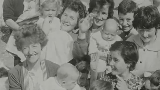 Women and children at train station, August Bank Holiday (1962)