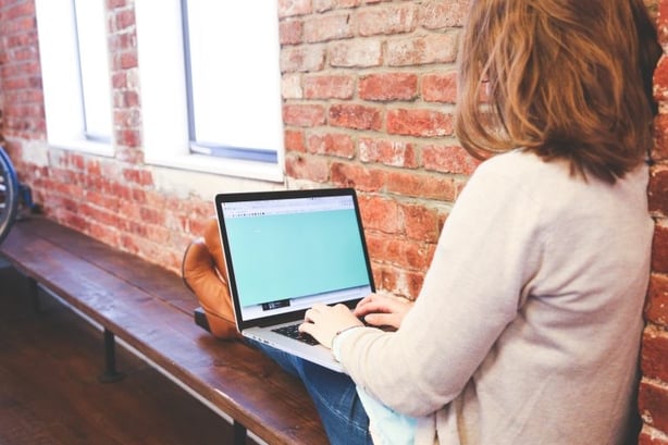 woman using laptop