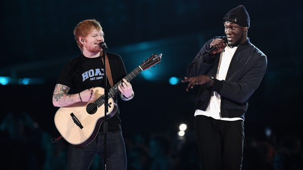 Sheeran and Stormzy at the Brit Awards earlier this year - Up against each other on Mercury Prize night on September 14