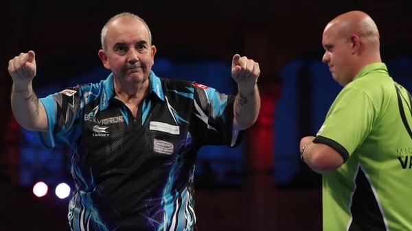 Phil Taylor stunned the world number one Michael van Gerwen (pic Lawrence Lustig PDC)