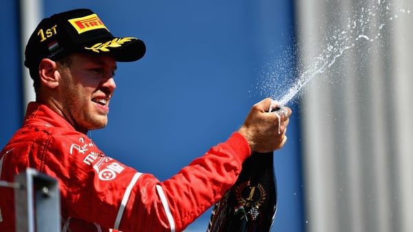 Sebastian Vettel celebrates his win in Budapest