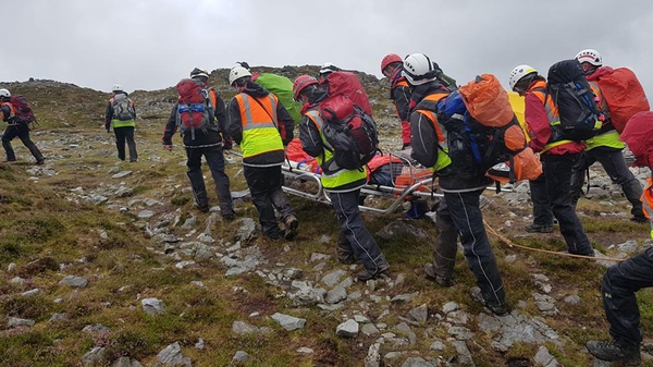A casualty is stretchered off the mountain by medical staff (Pics: Mayo Mountain Rescue)