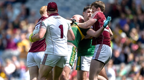 Kieran Donaghy and Declan Kyne tussle during the All-Ireland quarter-final