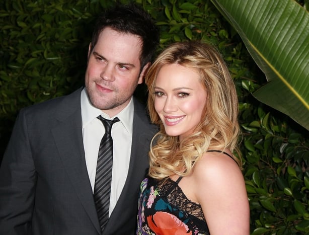Professional hockey player Mike Comrie (L) and wife actress Hilary Duff attend An Evening of 'Southern Style' presented by the St. Bernard Project & the Spears family at a private residence on May 11, 2011