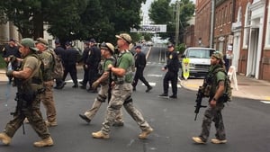 Armed citizen militia on the march in Charlotttesville last Saturday. Photo: EPA/Virginia State Police