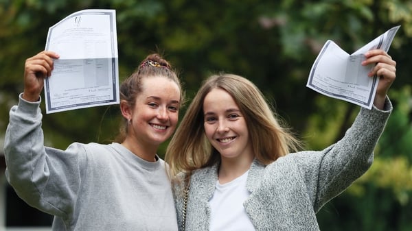 Ciara Curley (L) and Aoife Moore celebrate their results at Maryfield College, Drumcondra, Dublin
