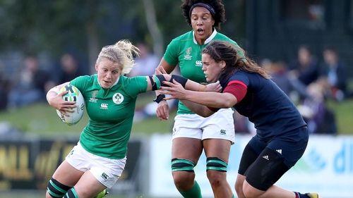 Ireland's Claire Molloy is tackled by Annaelle Deeshaye of France