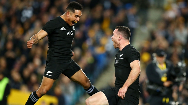 Aaron Smith and Ryan Crotty celebrate in Sydney