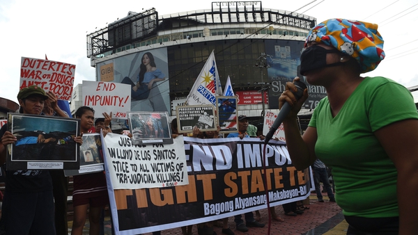 Relatives protest against extra judicial killings in the Philippines