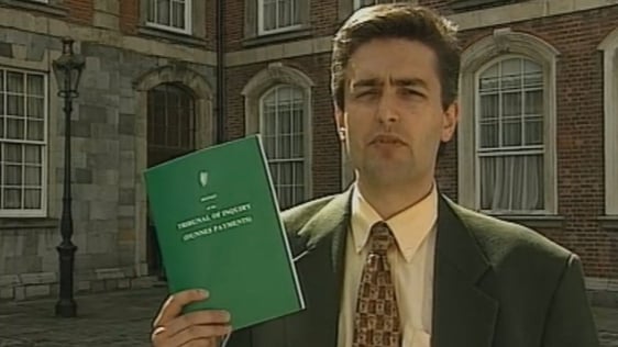 David McCullagh holding McCracken Report (1997)