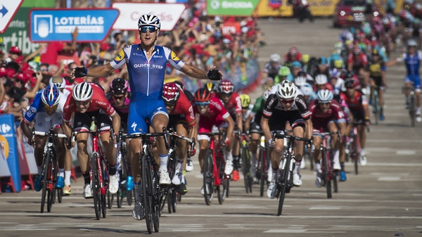 Matteo Trentin celebrates as he crosses to win Stage 4 of the Vuelta a Espana