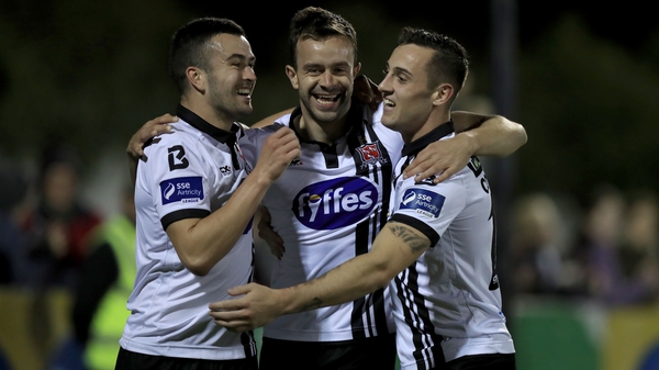 Dundalk's Robbie Benson celebrates scoring his side's fourth goal with MIchael Duffy and Dylan Connolly