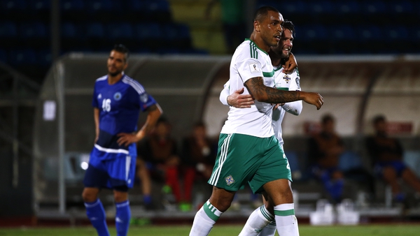 Josh Magennis and Oliver Norwood celebrate after the former scored Northern Ireland's second goal