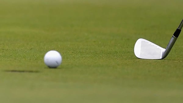 Sergio Garcia of Spain (not pictured) putts with an iron on the 18th green