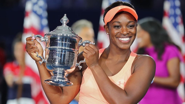 Sloane Stephens poses with the trophy