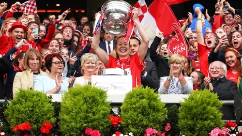 Cork captain Rena Buckley lifts the O'Duffy Cup