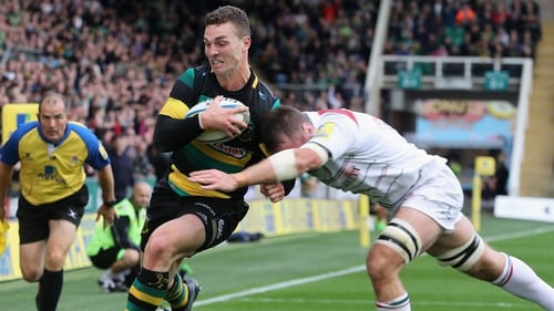 George North of Northampton is tackled by Dominic Ryan