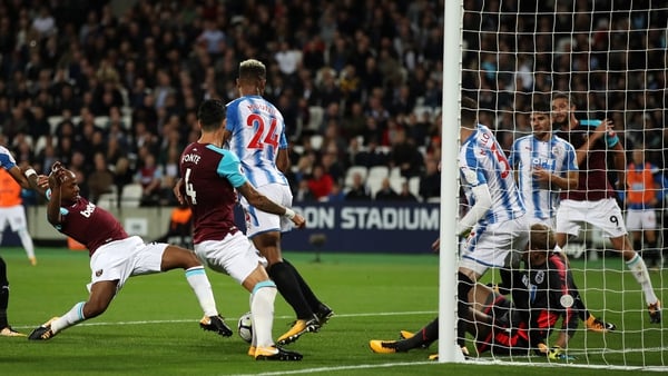 Andre Ayew slots home West Ham's second