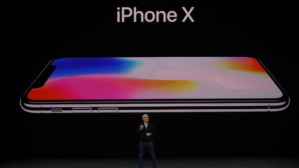 Tim Cook introduces the latest iPhone. Photo: Getty Images