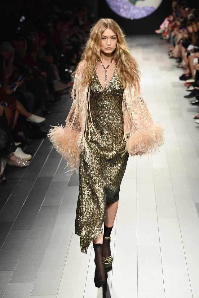 Model Gigi Hadid looks ready for Coachella on the Anna Sui runway.