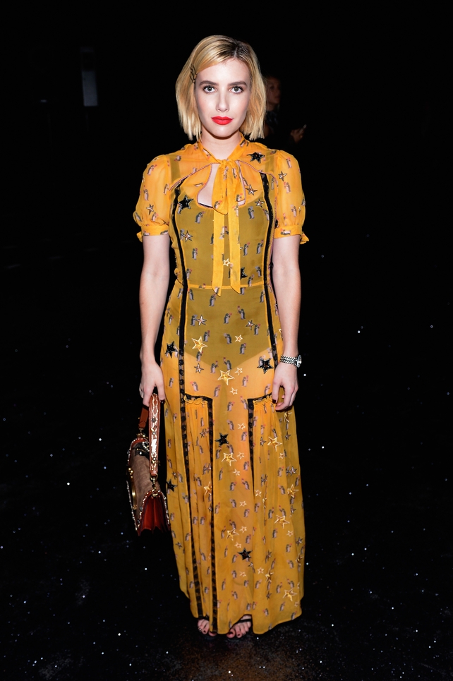 Actress Emma Roberts looks striking at the Coach Spring fashion show.