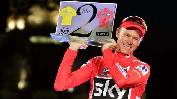 Froome wears the red jersey of the Vuelta a Espana winner