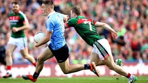 Con O'Callaghan gets past Colm Boyle