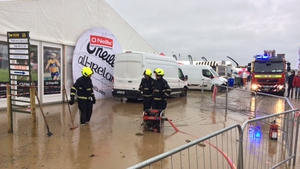 Sections of the tented village area have been closed as muddy water flowed between marquees and pooled in areas