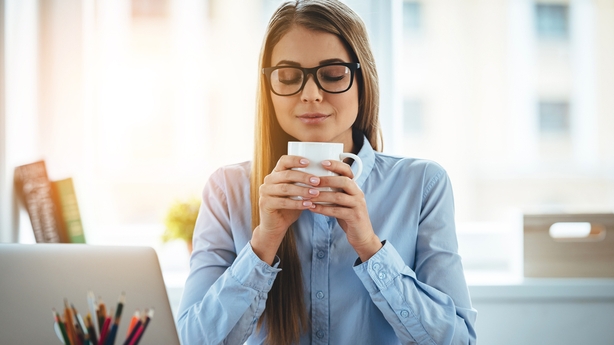 woman drinking coffee