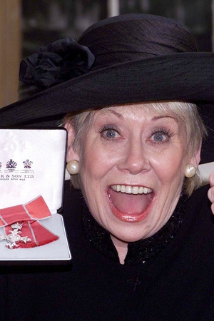 Liz at Buckingham Palace after she received an MBE.