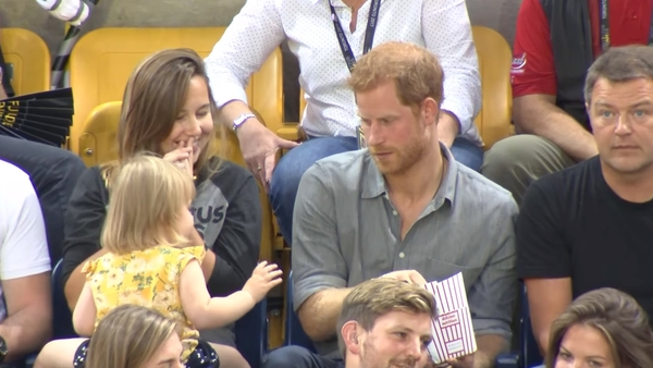 Video of young girl swiping Prince Harry's popcorn has gone viral