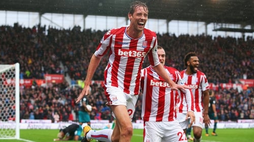 Peter Crouch celebrates his late winner for Stoke