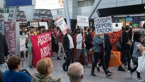 Activists protest against the expulsion of Afghan refugees at Dusseldorf airport in Germany