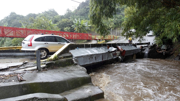 A bridge over a high river due to hard rains in Sabanilla area in Alajuelita, Costa Rica