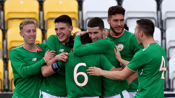 Ireland players celebrate with Reece Grego-Cox after scoring a hat-trick against Israel.