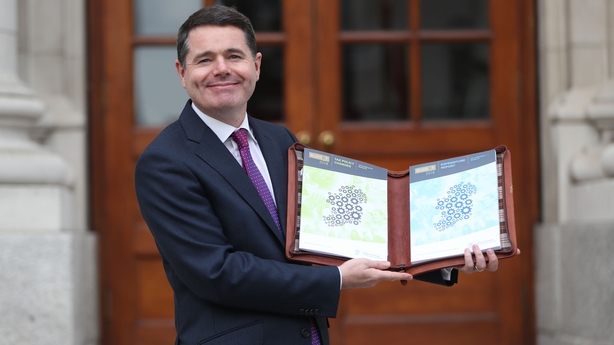 Minister Donohue on his way to delivering this afternoon's budget.