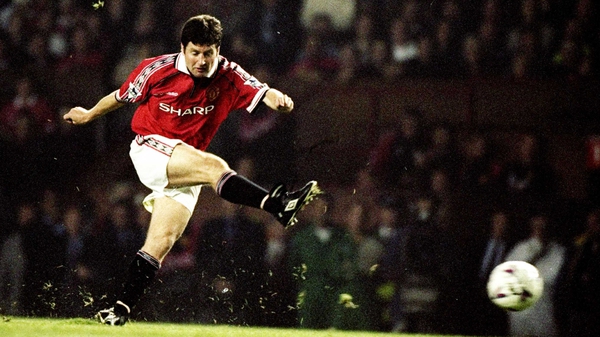 Denis Irwin in action against Liverpool at Old Trafford in 1998