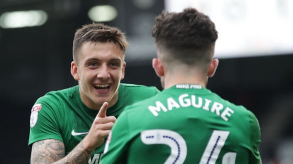 Seán Maguire and Jordan Hugill celebrate a goal for Preston North End.