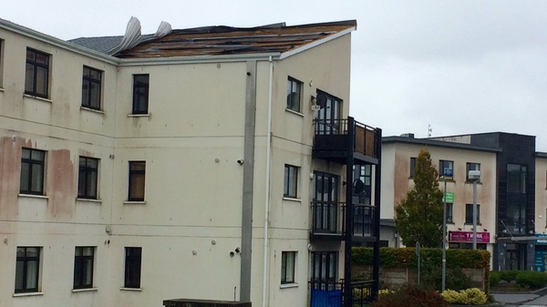 The roof is being peeled off an apartment building at River Village, Athlone