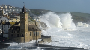 Waves break at Porthleven in Cornwall