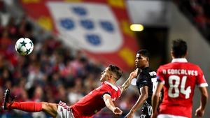 Benfica's Spanish defender Grimaldo Garcia clears the danger