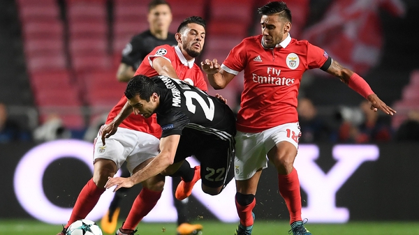 Eduardo Salvio of Benfica and United's Henrikh Mkhitaryan clash