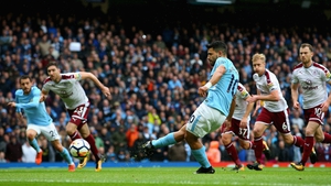 Sergio Aguero slots home the opening goal