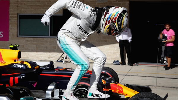 Lewis Hamilton celebrates at the end of the US Grand Prix which sees him on the brink of a third world title