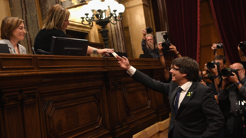 Catalan President Carles Puigdemont casts his vote for independence from Spain