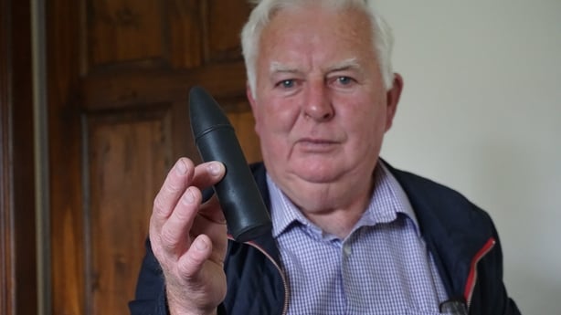 Gerry Ginty, Ballina Leigue Cemetery with rubber bullet fired by Irish Army during commemoration for Frank Stagg
