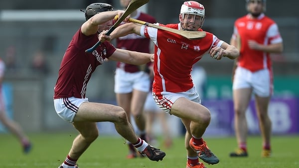 Evan Cody (L) attempts to tackle 
Cuala's Con O'Callaghan